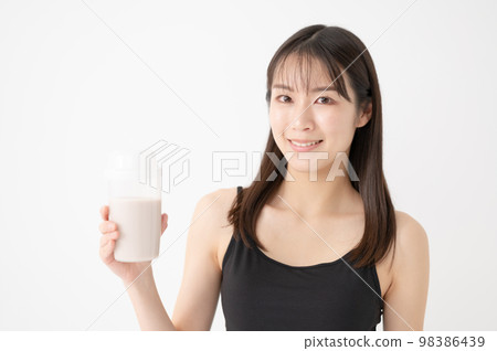 Woman with protein exercise diet Woman with protein exercise diet 98386439