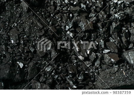 Black coal stones close-up. Solid advertising background.. Black coal stones close-up. Solid advertising background.. 98387359