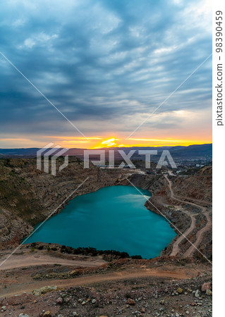 Sunrise in autumn on the shores of Lake overlooking Sunrise in autumn on the shores of Lake overlooking 98390459
