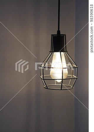 closeup black steel Iron lights hang down on a white wall background, object, light, decor, modern, vintage, copy space 98390618