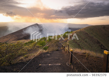 Hiking path in volcano crater 98392370