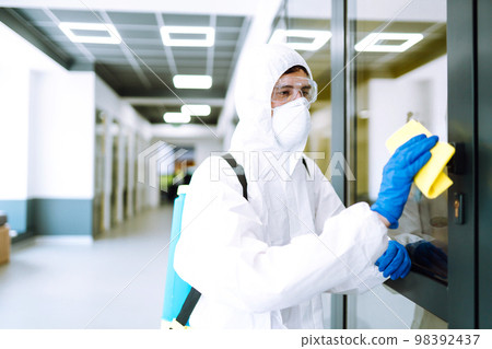 Cleaning and disinfection of office to prevent COVID-19. Prevention of spreading pneumonia virus. Cleaning and disinfection of office to prevent COVID-19. Prevention of spreading pneumonia virus. 98392437
