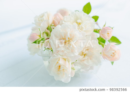 Rose bouquet, pale pink, white, white background, mini roses, bouquet, stylish, copy space 98392566