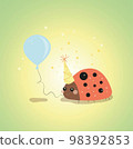 a small smiling ladybug in a festive cap 98392853