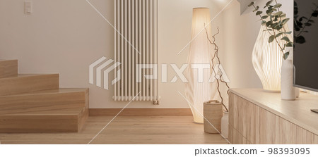 A cozy Home interior in warm beige tones in Japanese and Scandinavian Style. Modern Scandinavian Living Room Interior Design. Japandi Concept A cozy Home interior in warm beige tones in Japanese and Scandinavian Style. Modern Scandinavian Living Room Interior Design. Japandi Concept 98393095