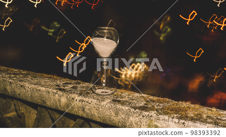 hourglass at night hourglass at night 98393392