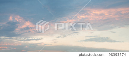 Bright clouds in the evening sky 98393574