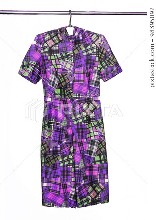 Elegant midi dress with abstract geometric colored pattern, isolated on white background Elegant midi dress with abstract geometric colored pattern, isolated on white background 98395092