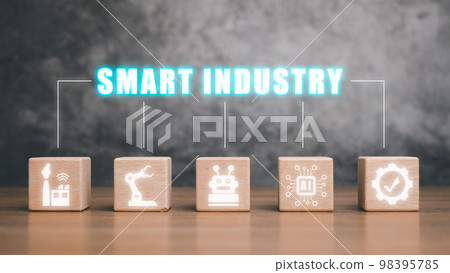 Smart industry 4.0 concept, Wooden block on desk with smart industry icon on virtual screen. Smart industry 4.0 concept, Wooden block on desk with smart industry icon on virtual screen. 98395785