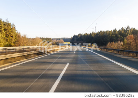 Ttraffic on highway ,fast cars traveling on the highway ,abstract speed transportation background Ttraffic on highway ,fast cars traveling on the highway ,abstract speed transportation background 98396282