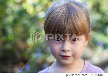 Portrait of little girl with surprised expression on face Portrait of little girl with surprised expression on face 98396869