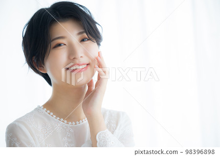 A woman with short hair 98396898