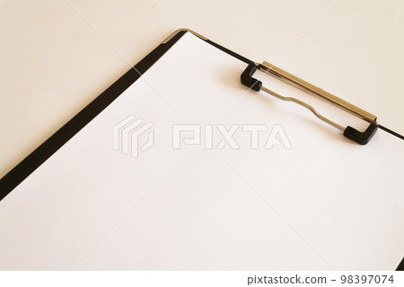 white paper on clipboard 98397074