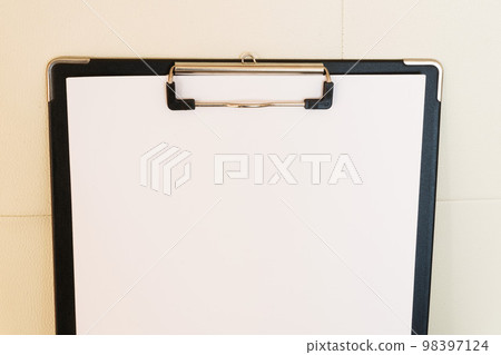 white paper on clipboard 98397124