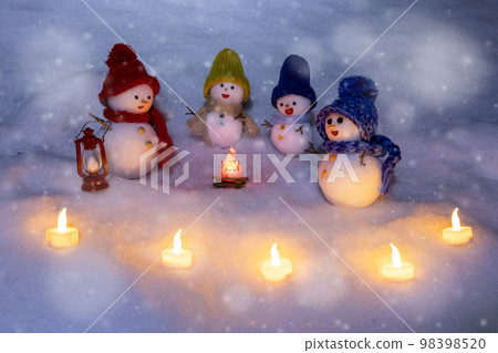 Snow candle and snowman family Snow candle and snowman family 98398520