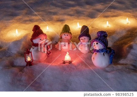 Snow candle and snowman family Snow candle and snowman family 98398525