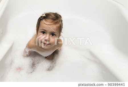 Little girl taking a bubble bath. Healthcare and hygiene concept. 98399441