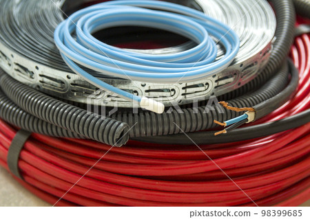 Heating floor system wires and cables. Renovation and construction concept. Comfort house. 98399685