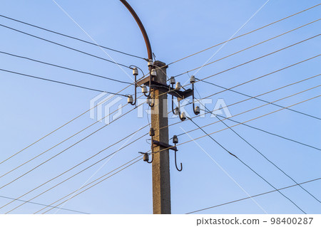 Electric pole power lines and wires with blue sky Electric pole power lines and wires with blue sky 98400287