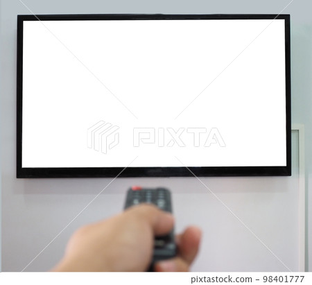 Empty TV screen  and the hand is holding the remote control to change the channel. 98401777