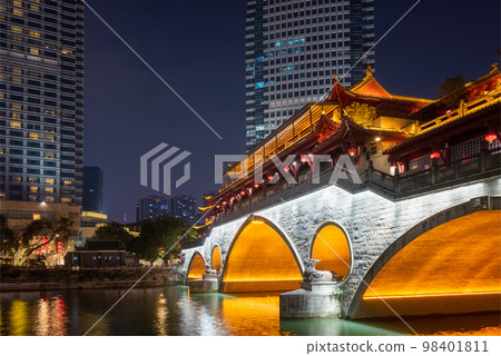 Chengdu Anshun bridge against skyscrapers and Jinjiang river at night, Sichuan province, China Chengdu Anshun bridge against skyscrapers and Jinjiang river at night, Sichuan province, China 98401811