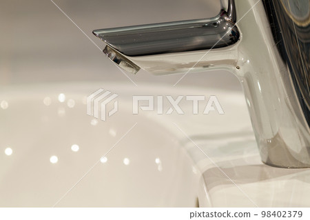 Bathroom interior with sink and faucet valve. Bathroom interior with sink and faucet valve. 98402379