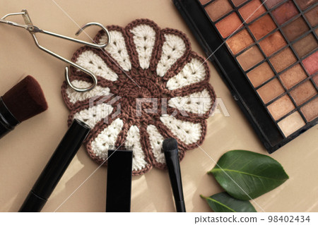 Beauty image of makeup tools and eyeshadow palette Beauty image of makeup tools and eyeshadow palette 98402434