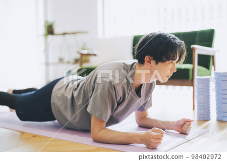 Men training at home Men training at home 98402972