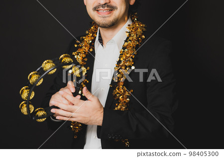 man with tambourine man with tambourine 98405300