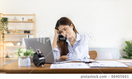 Young woman stressed or worried about doing a wrong job, Despair or disappointment, Sad feeling, Suffering, Desperate, Hopeless, Fail, disastrous, bankrupt, Scared, panicky, Failure of life. Young woman stressed or worried about doing a wrong job, Despair or disappointment, Sad feeling, Suffering, Desperate, Hopeless, Fail, disastrous, bankrupt, Scared, panicky, Failure of life. 98405681