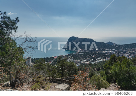 View of the resort city Novyi Svet and Green bay from trail. Crimea. View of the resort city Novyi Svet and Green bay from trail. Crimea. 98406263