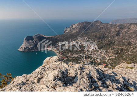 View of the resort city Novyi Svet and Green bay from the top of Sokol Mountain. Crimea. View of the resort city Novyi Svet and Green bay from the top of Sokol Mountain. Crimea. 98406264