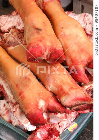 Pig feet displayed in a Korean market Pig feet displayed in a Korean market 98407187