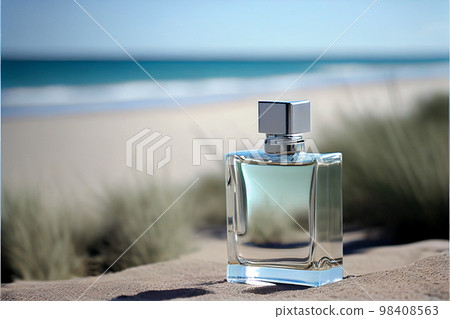transparent spray bottle of perfume close up backdrop of sea in sun. Presentation of unisex perfumes in sea environment. 98408563