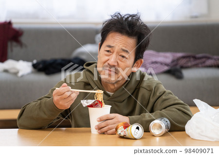 Rough lifestyle image of a man in his 50s 98409071