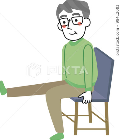 Senior man sitting on a chair and exercising leg raises Senior man sitting on a chair and exercising leg raises 98412083
