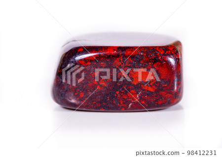 Macro mineral stone jasper hematite on white background 98412231
