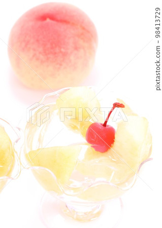 Peach jelly dessert peach bright background 98413729