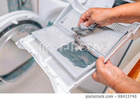 Dust and dirt trapped by the clothes dryer filter. Dust and dirt trapped by the clothes dryer filter. 98413748