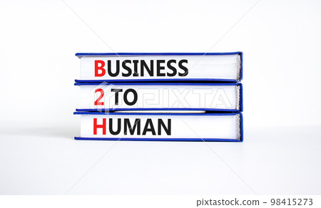 B2H business to human symbol. Concept words B2H business to human on books on a beautiful white table white background. Business and B2H business to human concept. Copy space. B2H business to human symbol. Concept words B2H business to human on books on a beautiful white table white background. Business and B2H business to human concept. Copy space. 98415273