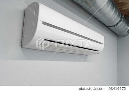 Air conditioner on gray wall room interior Air conditioner on gray wall room interior 98416575