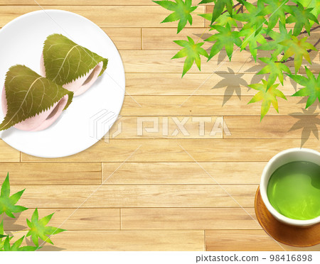 Japanese style illustration set of sakuramochi with cherry leaves on a plate with tea on a natural wood deck - hand drawn background material 98416898