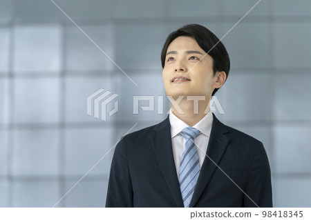 Young man in a suit portrait Young man in a suit portrait 98418345