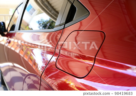 gas tank of glossy red car, transportation industry gas tank of glossy red car, transportation industry 98419683