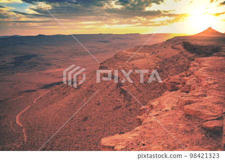 Beautiful dramatic sunset over the desert. Nature landscape. Makhtesh Ramon Crater, Israel 98421323