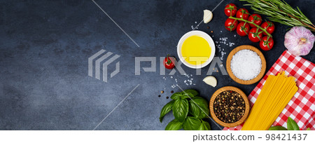 Food background from vegetable, spices, herb on black table 98421437