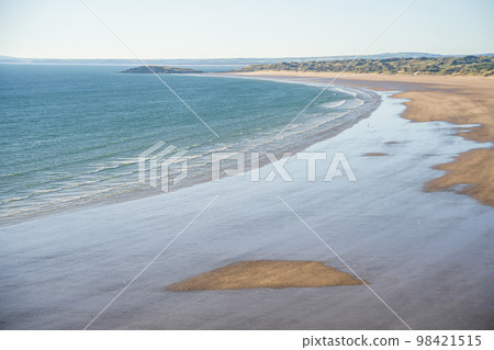 Rhossili Bay beach, Gower Peninsula, Swansea, South Wales, United Kingdom. 98421515