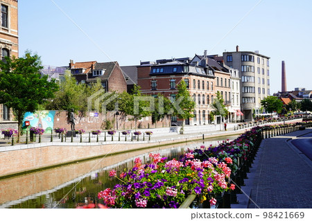 Beautiful canals of Ghent, Belgium, decorated with flowers 98421669