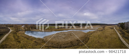 Aerial panoramic view of countryside and brook. Panorama. Natural landscape. Early spring 98421718
