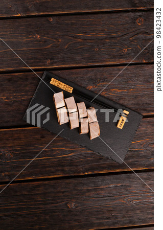 Asian dessert maki sushi - Roll with banana and chocolate cream top view 98423432